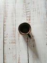 Cup of mexican style coffee on vintage white wooden table Royalty Free Stock Photo