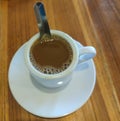A cup of milk coffee with a slightly blurred background Royalty Free Stock Photo