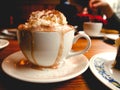 Cup of mochaccino served with delicious cream on the top Royalty Free Stock Photo
