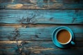 A cup of morning coffee on blue wooden table, the magic of a peaceful morning scene Royalty Free Stock Photo