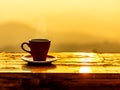 Cup of morning coffee in the silhouette before sunrise Royalty Free Stock Photo