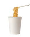 Cup noodle and fork isolated on white background Royalty Free Stock Photo