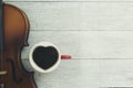 Cup ofcoffee and violin Royalty Free Stock Photo