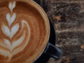 A cup off coffee latte on wooden table Royalty Free Stock Photo