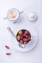 Cup of pink roses tea Royalty Free Stock Photo