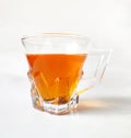 A cup of red tea on a white background.Rooibos tea.red bush tea Royalty Free Stock Photo