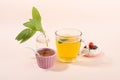 Cup of sage herbal tea, fresh sage leaves, honey and lemon