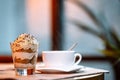 Cup, saucer, spoon and dessert in a glass Royalty Free Stock Photo