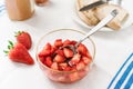 Cup of sliced strawberries for breakfast Royalty Free Stock Photo