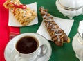 Cup of steaming coffee with croissants. Royalty Free Stock Photo