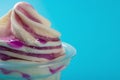 Cup of strawberry flavor ice cream on blue with copy space Royalty Free Stock Photo
