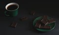 a cup of strong hot coffee with pieces of dark chocolate on a saucer on a dark background.