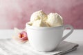 Cup with tasty vanilla ice cream Royalty Free Stock Photo