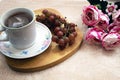 Cup of te and grapes