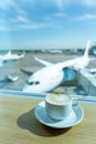 Cup of tea in airport`s business lounge. Waiting for the flight Royalty Free Stock Photo