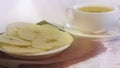 Cup of tea with Baked Dehydrated Apples Chips Royalty Free Stock Photo