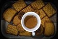 A cup of tea with biscuits and breads surved in a tray Royalty Free Stock Photo