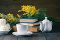 Cup of tea with book and sweets Royalty Free Stock Photo