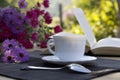 Cup of tea , a bouquet of flowers and a book Royalty Free Stock Photo