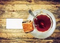 Cup of tea and bread roll Royalty Free Stock Photo