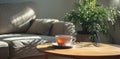 a cup of tea and a bundle of dried leaves on a wooden table