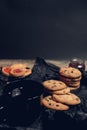 Cup of tea with chocolate cookies and biscuits on black table background. Afternoon break time. Breakfast. Royalty Free Stock Photo