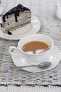 A cup of tea with chocolate crape cake Royalty Free Stock Photo