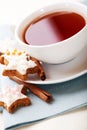 Cup of tea with cinnamon stars for christmas Royalty Free Stock Photo