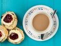 Cup of Tea or Coffee With Scones Clotted Cream and Strawberry Jam Royalty Free Stock Photo