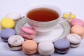 Cup of tea with colorful french macaron Royalty Free Stock Photo
