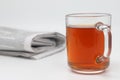A cup of tea with cookies and a morning newspaper on a white background. Royalty Free Stock Photo