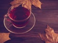 Cup of tea with a close-up on a black table Royalty Free Stock Photo