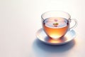 A cup of tea with a floating flower. Space for text. Royalty Free Stock Photo