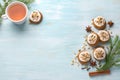 A cup of tea with fragrant honey Christmas gingerbreads with glaze and nuts Royalty Free Stock Photo