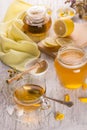 Cup of tea and honey in a glass jar Royalty Free Stock Photo