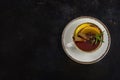 Cup of tea with lemon and brown sugar, cinnamon and anise on the table Royalty Free Stock Photo