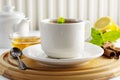 Cup tea with lemon and honey on a white background. Hot tea cup isolated, top view. Autumn, fall or winter drink. Copy space Royalty Free Stock Photo