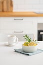 A cup of tea with lemon and a teapot on a white table Royalty Free Stock Photo