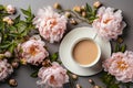 cup of tea with milk on table with summer tender peonies top view on table, flat lay. AI generated Royalty Free Stock Photo