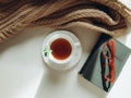 Cup of tea with mint, book and glasses Royalty Free Stock Photo