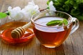 Cup of tea with mint and honey Royalty Free Stock Photo