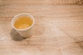A cup of tea paper placed on a wooden table with free space Royalty Free Stock Photo