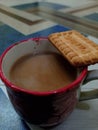 Cup of tea with Parle G Royalty Free Stock Photo