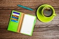 Cup of tea, pen, opened organizer Royalty Free Stock Photo