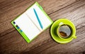 Cup of tea, pen, opened organizer Royalty Free Stock Photo