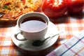 Cup of tea and pizza Royalty Free Stock Photo