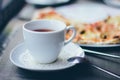 A cup of tea and pizza Royalty Free Stock Photo