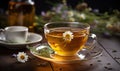 Cup of Tea and Plate of Flowers on Table Royalty Free Stock Photo