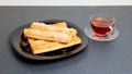 Cup of tea and puff pastry Royalty Free Stock Photo