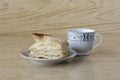 Cup of tea and a puff pastry Royalty Free Stock Photo